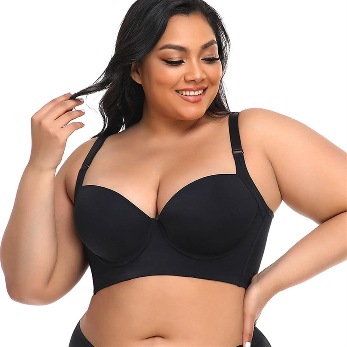 Back-smoothing bra in black, front view on a plus size model